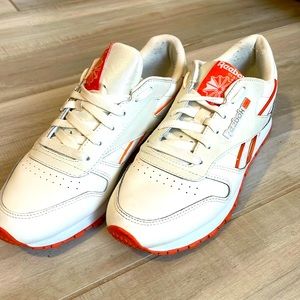Reebok classics, salmon orange trim. Size 8,5